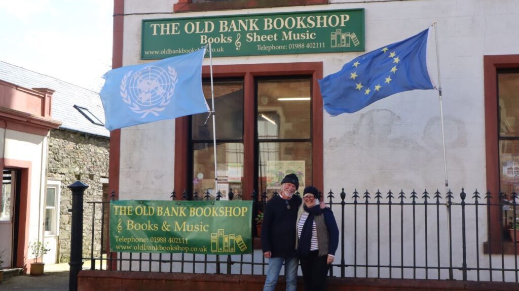 Joyce and Ian Cochrane outside the shop today.