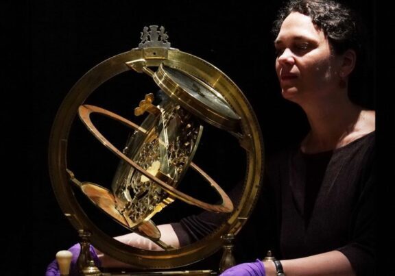 Curator Dr Rebekah Higgitt and the Ilay Glynne dial at the National Museum of Scotland. Credit: Stewart Attwood 