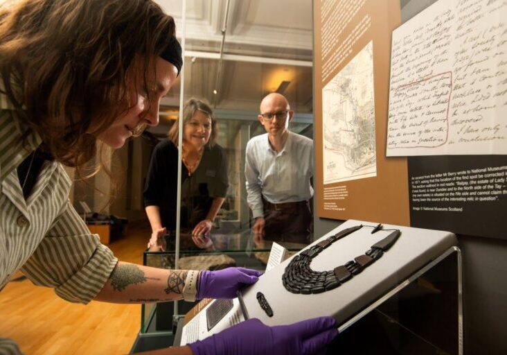 Curators and conservators install a 4000-year-old Bronze Age necklace at The McManus in Dundee. Photo (c) Alan Richardson (1)