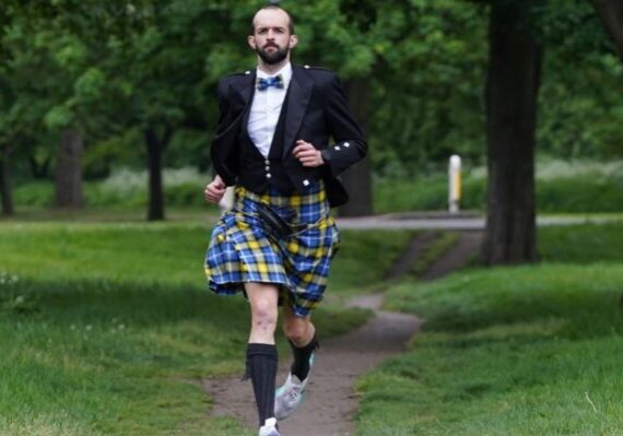 Stephen Molloy broke the world record for running a marathon in full Highland dress for the My Name'5 Doddie Foundation. Credit: Stewart Atwood.